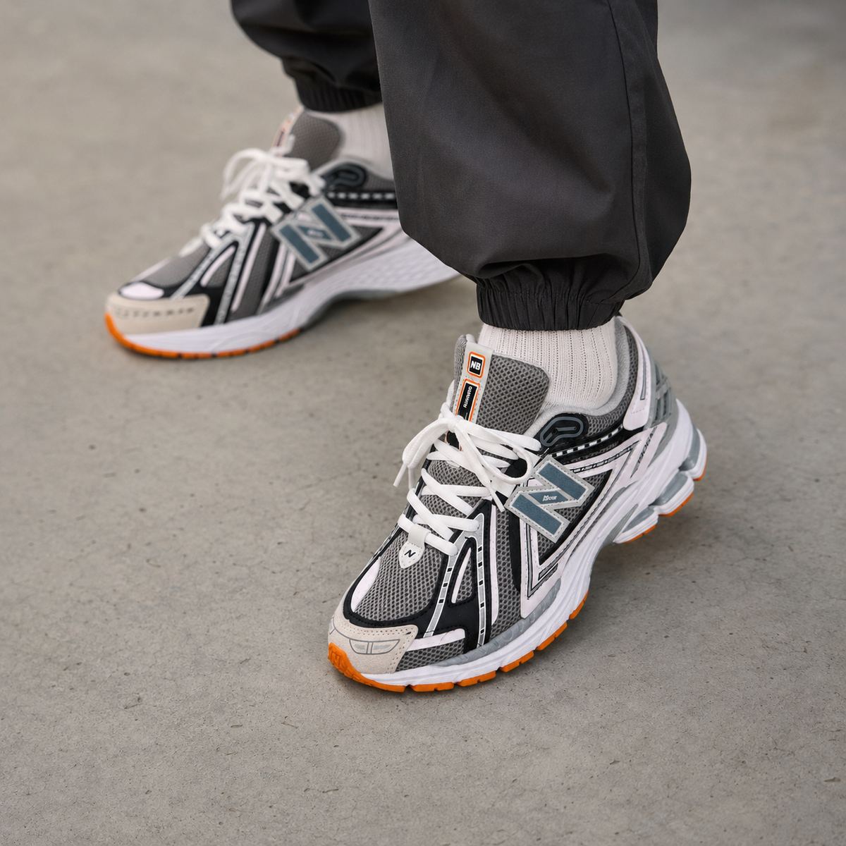 NB 1906A Grey White Orange – Sneakers Premium Gri cu Accente Portocalii